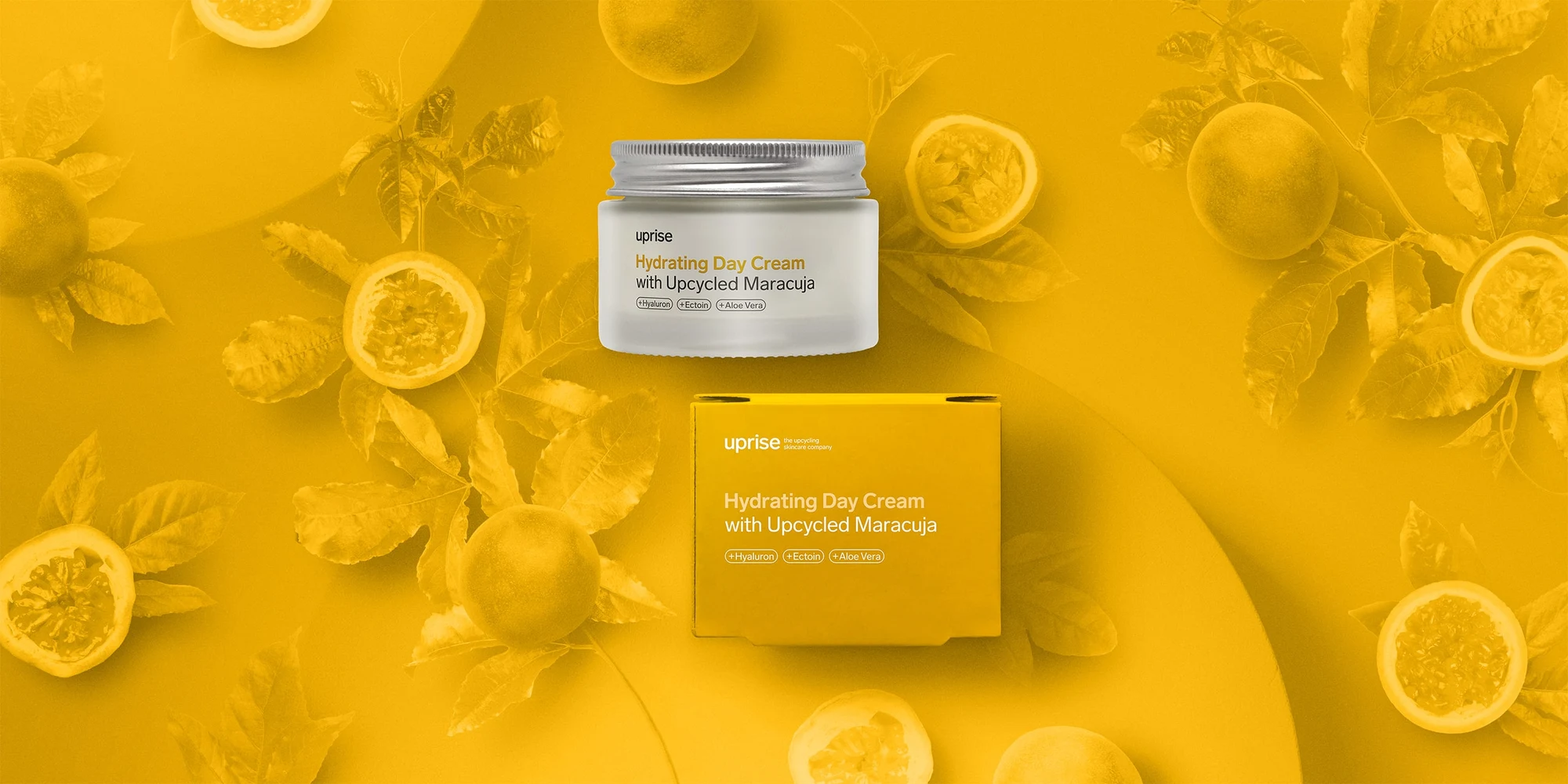 UPRISE Day Cream und Verpackung in einer gelben Maracuja-Bildwelt